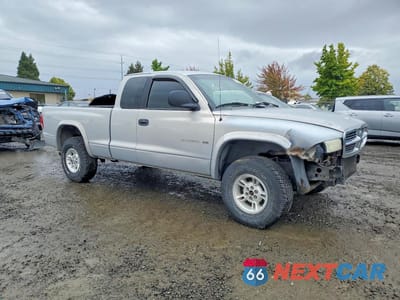 Czwarte zdjęcie samochodu z boku: 1999 DODGE DAKOTA SLT VIN:1B7GG22Y3XS279466 - miniatura