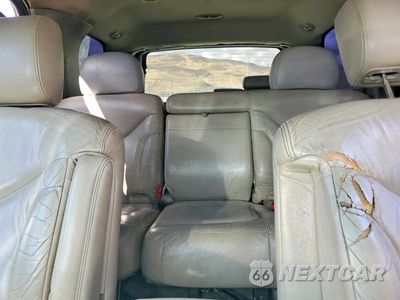 Zdjęcie 10 z 14 samochodu: 2002 GMC YUKON VIN:1GKEC13T22R295369 - miniatura