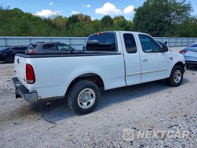 Trzecie zdjęcie samochodu z tyłu: 2000 FORD F150 VIN:1FTRX17L7YKA81880 - miniatura