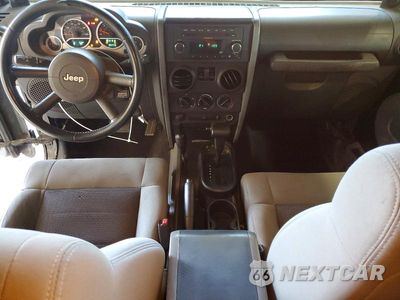 Zdjęcie 8 z 12 samochodu: 2010 JEEP WRANGLER SPORT VIN:1J4AA2D11AL103163 - miniatura