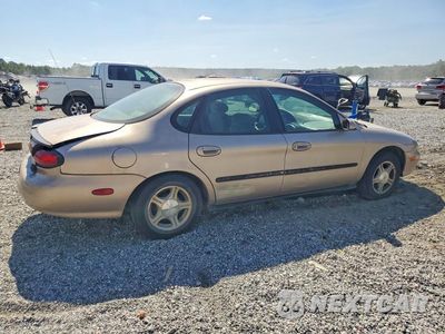 Trzecie zdjęcie samochodu z tyłu: 1999 FORD TAURUS SE VIN:1FAFP53U5XA195914 - miniatura
