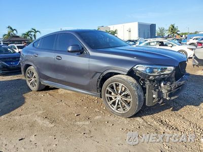 Czwarte zdjęcie samochodu z boku: 2022 BMW X6 XDRIVE40I VIN:5UXCY6C08N9J38035 - miniatura