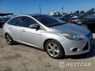Czwarte zdjęcie samochodu z boku: 2014 FORD FOCUS SE VIN:1FADP3F29EL144309 - miniatura