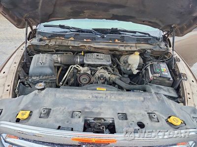 Zdjęcie 11 z 13 samochodu: 2010 DODGE RAM 1500 VIN:3D7JB1EK5AG118580 - miniatura