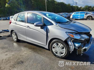 Czwarte zdjęcie samochodu z boku: 2018 HONDA FIT LX VIN:3HGGK5H49JM730891 - miniatura