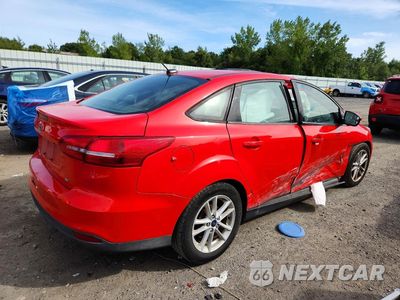 Trzecie zdjęcie samochodu z tyłu: 2017 FORD FOCUS SE VIN:1FADP3F20HL321611 - miniatura