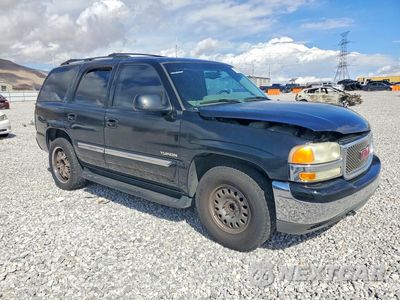Czwarte zdjęcie samochodu z boku: 2002 GMC YUKON VIN:1GKEC13T22R295369 - miniatura