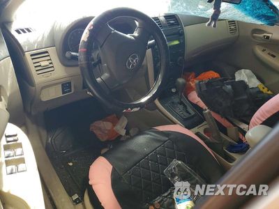 Zdjęcie 8 z 12 samochodu: 2009 TOYOTA COROLLA LE VIN:1NXBU40E79Z062478 - miniatura