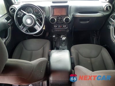 Zdjęcie 8 z 13 samochodu: 2015 JEEP WRANGLER UNLIMITED SPORT VIN:1C4BJWDG1FL503169 - miniatura