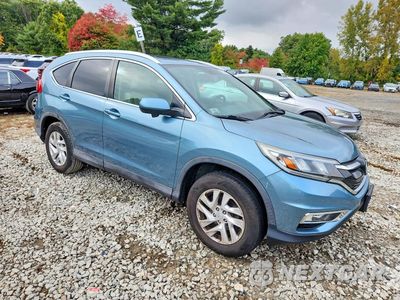 Czwarte zdjęcie samochodu z boku: 2015 HONDA CR-V EXL VIN:2HKRM4H79FH700812 - miniatura