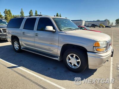 Czwarte zdjęcie samochodu z boku: 2005 GMC YUKON XL DENALI VIN:1GKFK66U05J217362 - miniatura