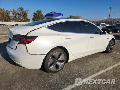 Trzecie zdjęcie samochodu z tyłu: 2019 TESLA MODEL 3 VIN:5YJ3E1EA1KF483721 - miniatura