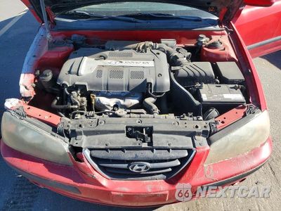 Zdjęcie 11 z 12 samochodu: 2004 HYUNDAI ELANTRA GT VIN:KMHDN56D14U107241 - miniatura