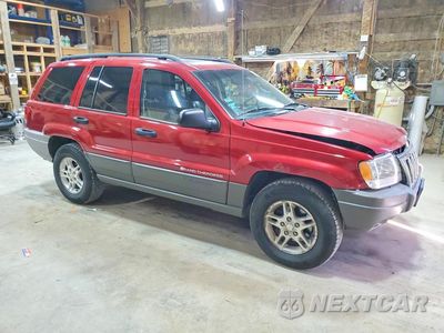 Czwarte zdjęcie samochodu z boku: 2002 JEEP GRAND CHEROKEE LAREDO VIN:1J4GW48S42C136220 - miniatura