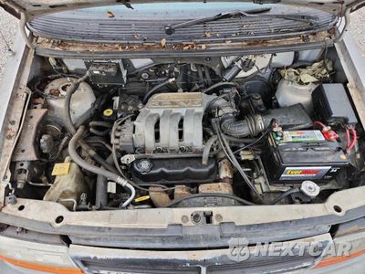 Zdjęcie 12 z 13 samochodu: 1995 DODGE GRAND CARAVAN SE VIN:1B4GH44R0SX625531 - miniatura