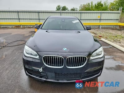 Piąte zdjęcie samochodu w środku: 2015 BMW 750 LXI VIN:WBAYF8C57FD653950 - miniatura