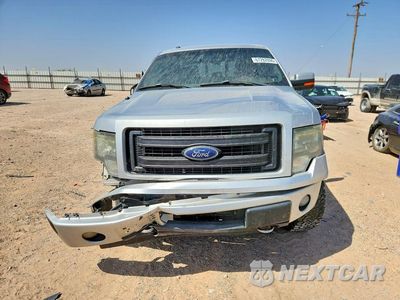 Piąte zdjęcie samochodu w środku: 2014 FORD F150 SUPERCREW VIN:1FTFW1EF9EKE55467 - miniatura
