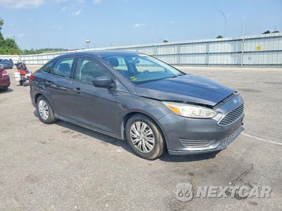 Czwarte zdjęcie samochodu z boku: 2016 FORD FOCUS VIN:1FADP3E29GL397005 - miniatura