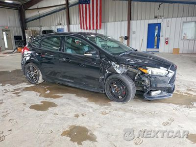 Czwarte zdjęcie samochodu z boku: 2016 FORD FOCUS ST VIN:1FADP3L9XGL275026 - miniatura