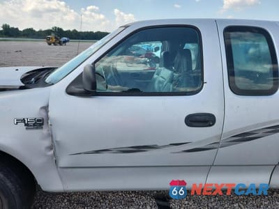 Zdjęcie 7 z 12 samochodu: 1999 FORD F150 VIN:1FTRX17WXXNB69636 - miniatura