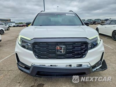 Piąte zdjęcie samochodu w środku: 2022 HONDA PASSPORT ELITE VIN:5FNYF8H07NB005130 - miniatura