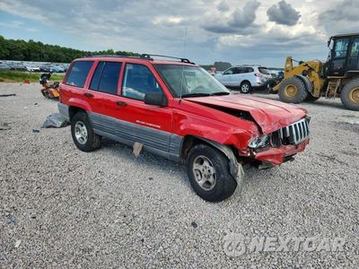 Czwarte zdjęcie samochodu z boku: 1996 JEEP GRAND CHEROKEE LAREDO VIN:1J4GZ58SXTC401706 - miniatura