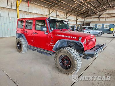 Czwarte zdjęcie samochodu z boku: 2012 JEEP WRANGLER UNLIMITED SAHARA VIN:1C4BJWEGXCL188981 - miniatura