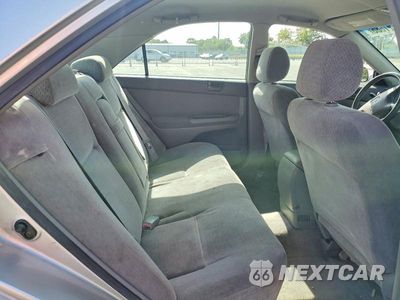 Zdjęcie 10 z 13 samochodu: 2003 TOYOTA CAMRY LE VIN:JTDBE32K130170897 - miniatura