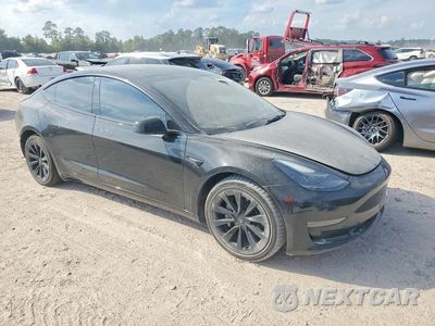 Czwarte zdjęcie samochodu z boku: 2022 TESLA MODEL 3 VIN:5YJ3E1EA6NF186271 - miniatura