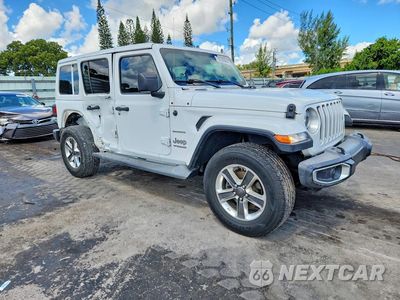 Czwarte zdjęcie samochodu z boku: 2019 JEEP WRANGLER UNLIMITED SAHARA VIN:1C4HJXEG8KW531087 - miniatura