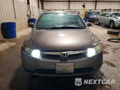 Piąte zdjęcie samochodu w środku: 2006 HONDA CIVIC LX VIN:1HGFA16586L081189 - miniatura
