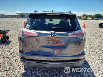 Zdjęcie 6 z 13 samochodu: 2017 TOYOTA RAV4 LE VIN:JTMZFREV8HJ701101 - miniatura