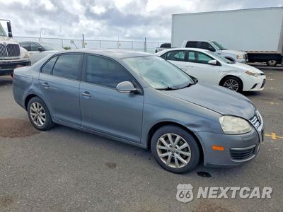 Czwarte zdjęcie samochodu z boku: 2010 VOLKSWAGEN JETTA SE VIN:3VWRZ7AJ0AM153826 - miniatura