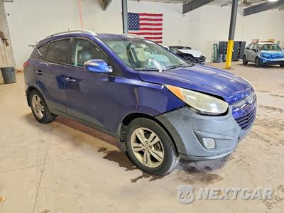 Czwarte zdjęcie samochodu z boku: 2013 HYUNDAI TUCSON GLS VIN:KM8JU3AC4DU573027 - miniatura