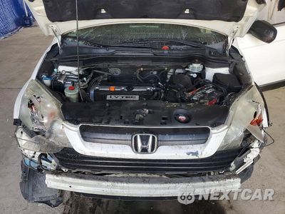 Zdjęcie 12 z 13 samochodu: 2009 HONDA CR-V LX VIN:5J6RE38369L029341 - miniatura