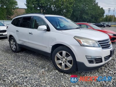 Czwarte zdjęcie samochodu z boku: 2016 CHEVROLET TRAVERSE LTZ VIN:1GNKVJKD6GJ232663 - miniatura