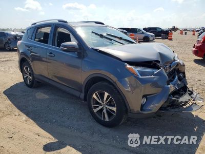 Czwarte zdjęcie samochodu z boku: 2018 TOYOTA RAV4 XLE VIN:JTMWFREV0JJ752097 - miniatura