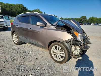 Czwarte zdjęcie samochodu z boku: 2011 HYUNDAI TUCSON LIMITED VIN:KM8JU3AC9BU296906 - miniatura
