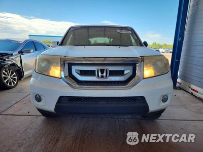 Piąte zdjęcie samochodu w środku: 2011 HONDA PILOT EXLN VIN:5FNYF3H77BB002823 - miniatura
