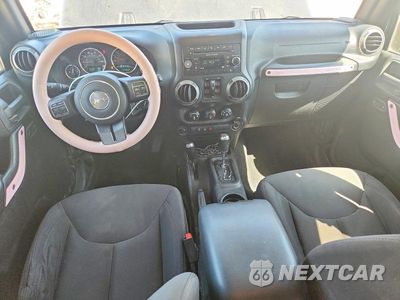 Zdjęcie 8 z 14 samochodu: 2015 JEEP WRANGLER UNLIMITED SPORT VIN:1C4BJWDG1FL762468 - miniatura