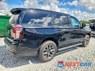 Trzecie zdjęcie samochodu z tyłu: 2021 CHEVROLET TAHOE K1500 Z71 VIN:1GNSKPKD0MR378713 - miniatura
