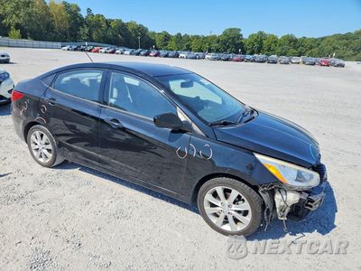 Czwarte zdjęcie samochodu z boku: 2014 HYUNDAI ACCENT GLS VIN:KMHCU4AE2EU767993 - miniatura