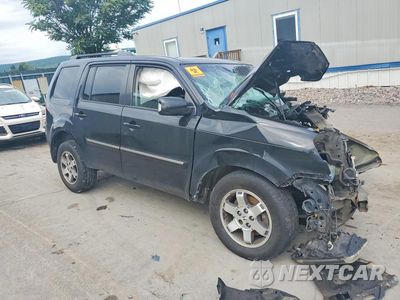 Czwarte zdjęcie samochodu z boku: 2011 HONDA PILOT TOURING VIN:5FNYF4H97BB102346 - miniatura