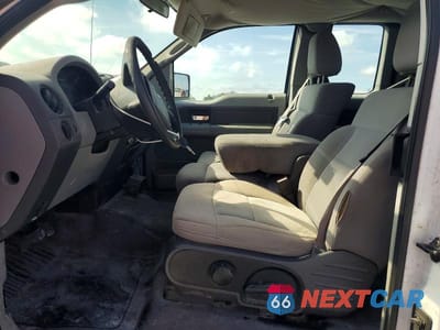Zdjęcie 7 z 12 samochodu: 2005 FORD F150 VIN:1FTRX12WX5FA37216 - miniatura