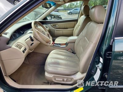 Zdjęcie 7 z 12 samochodu: 2002 TOYOTA AVALON XLS VIN:4T1BF28B72U241635 - miniatura