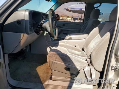 Zdjęcie 7 z 13 samochodu: 2004 CHEVROLET TAHOE C1500 VIN:1GNEC13Z94R321024 - miniatura