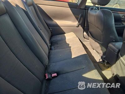 Zdjęcie 10 z 13 samochodu: 1999 TOYOTA CAMRY SOLARA SLE V6 VIN:2T1CF28P5XC166491 - miniatura