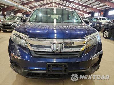 Piąte zdjęcie samochodu w środku: 2019 HONDA PILOT LX VIN:5FNYF6H11KB020845 - miniatura