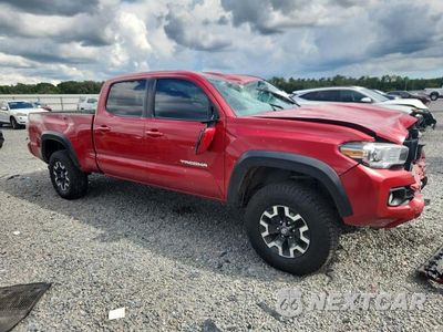 Czwarte zdjęcie samochodu z boku: 2022 TOYOTA TACOMA TRD OFF-ROAD VIN:3TMDZ5BN9NM135544 - miniatura