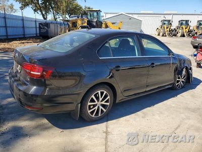 Trzecie zdjęcie samochodu z tyłu: 2017 VOLKSWAGEN JETTA SE VIN:3VWDB7AJXHM390350 - miniatura
